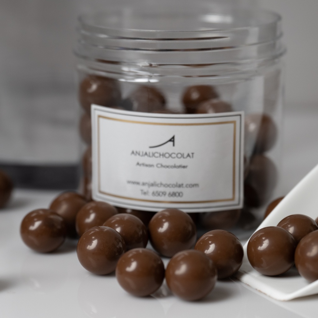 Anjali Chocolat_Hazelnut dragees in belgian milk chocolate couverture