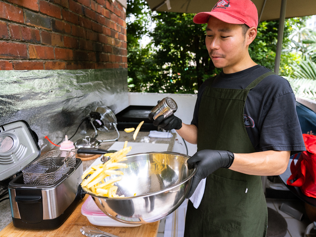 08 em burger daddy-ulrich chia preparing fries-HungryGoWhere