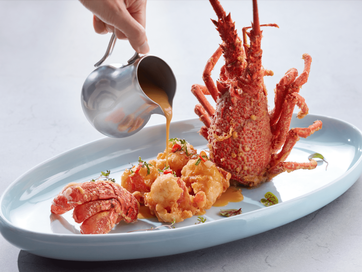 The lobster in signature creamy custard sauce.