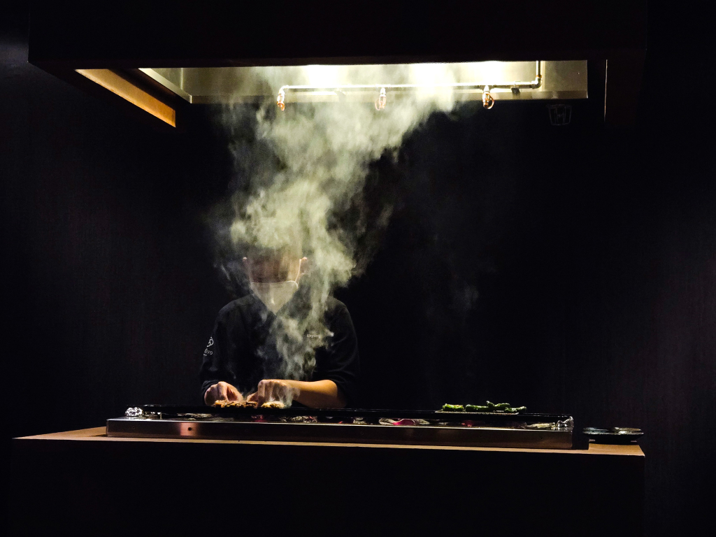 Chef Shyong helms the grill. Photo: Zawani Abdul Ghani/HungryGoWhere Sapoto