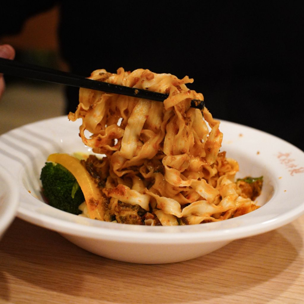 Chilli oil preserved egg and meat sauce noodles. Photo: Evan Mua/HungryGoWhere places to eat in Singapore