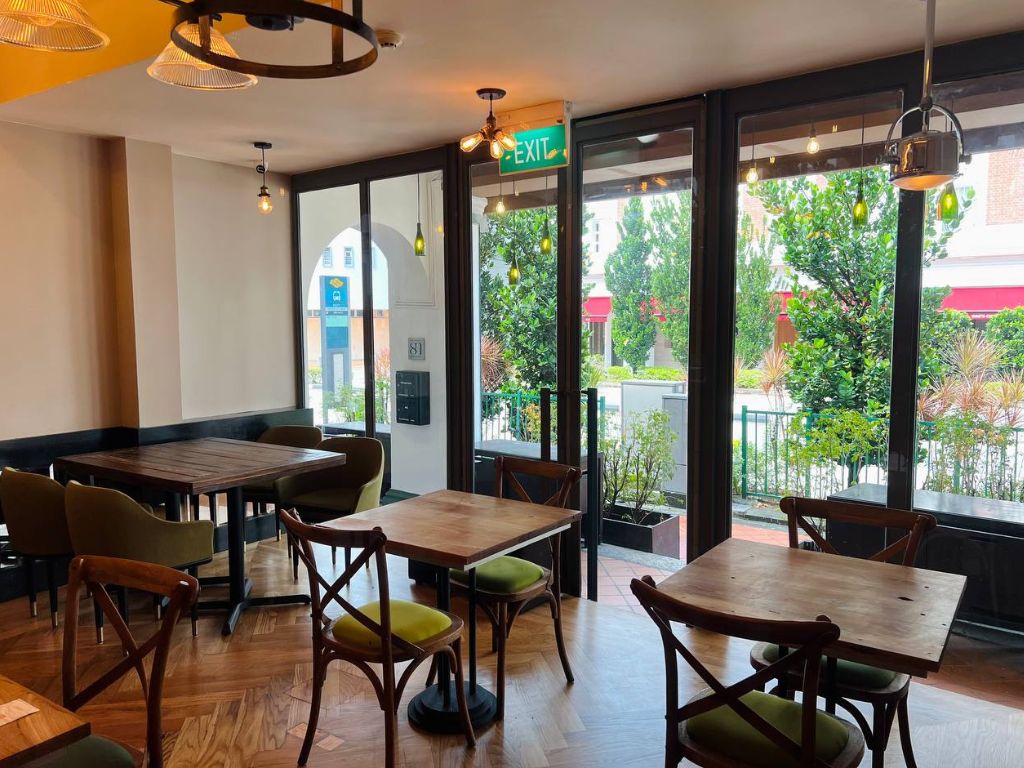The space has a warm and inviting ambience. Photo: Shannon Yap/HungryGoWhere Pizza Studio Tamaki