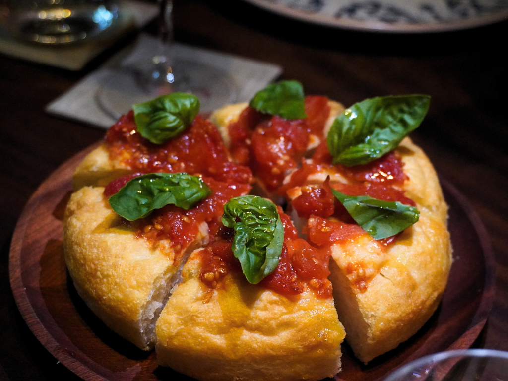 The pomodoro e basilico is a light and pillowy focaccia. Photo: Angeline Ang/HungryGoWhere Altro Zafferano Italian Restaurant