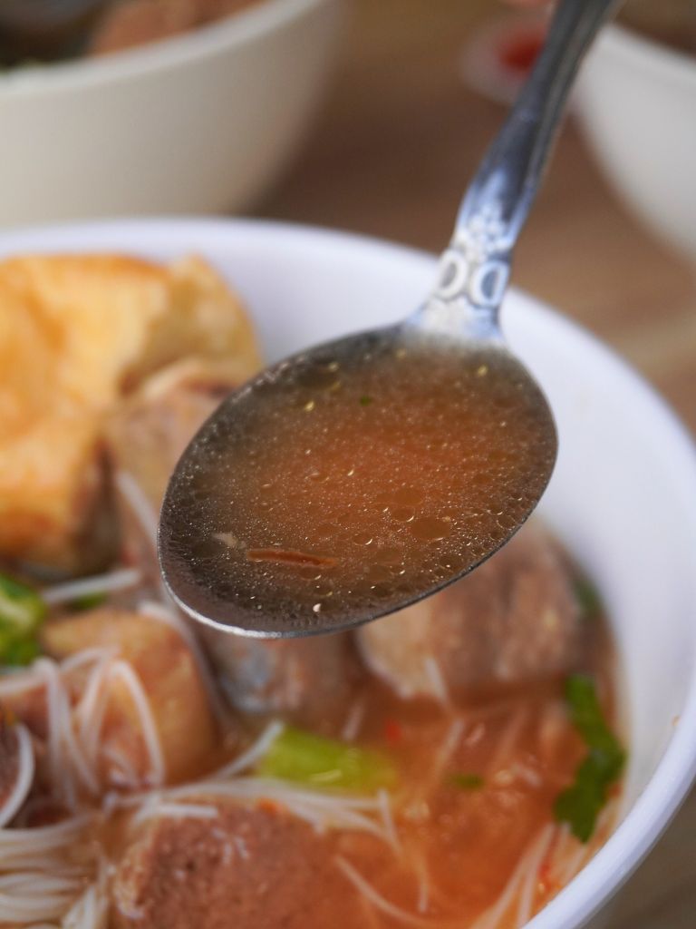 If you’re okay with heat, mix in the chilli — it transforms the bowl. Photo: Angeline Ang/HungryGoWhere sundanese kitchen