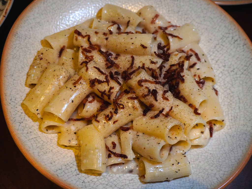A tableside moment that’s not to be missed — rigatoni tossed in a pecorino cheese wheel. Photo: Angeline Ang/HungryGoWhere Altro Zafferano Italian Restaurant