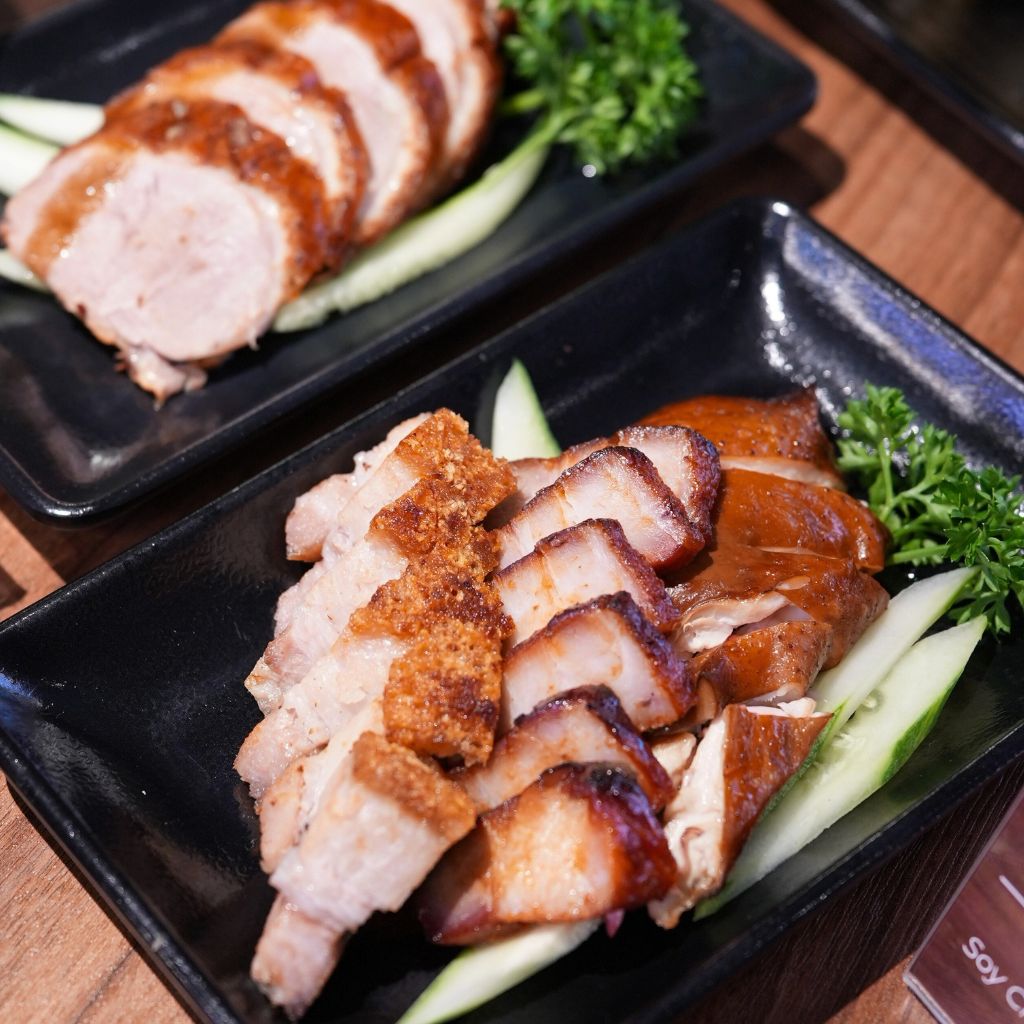 The three-meat platter is a must-try dish of Guan Chee Roasted Delights. Photo: Angeline Ang/HungryGoWhere fairprice finest sembawang