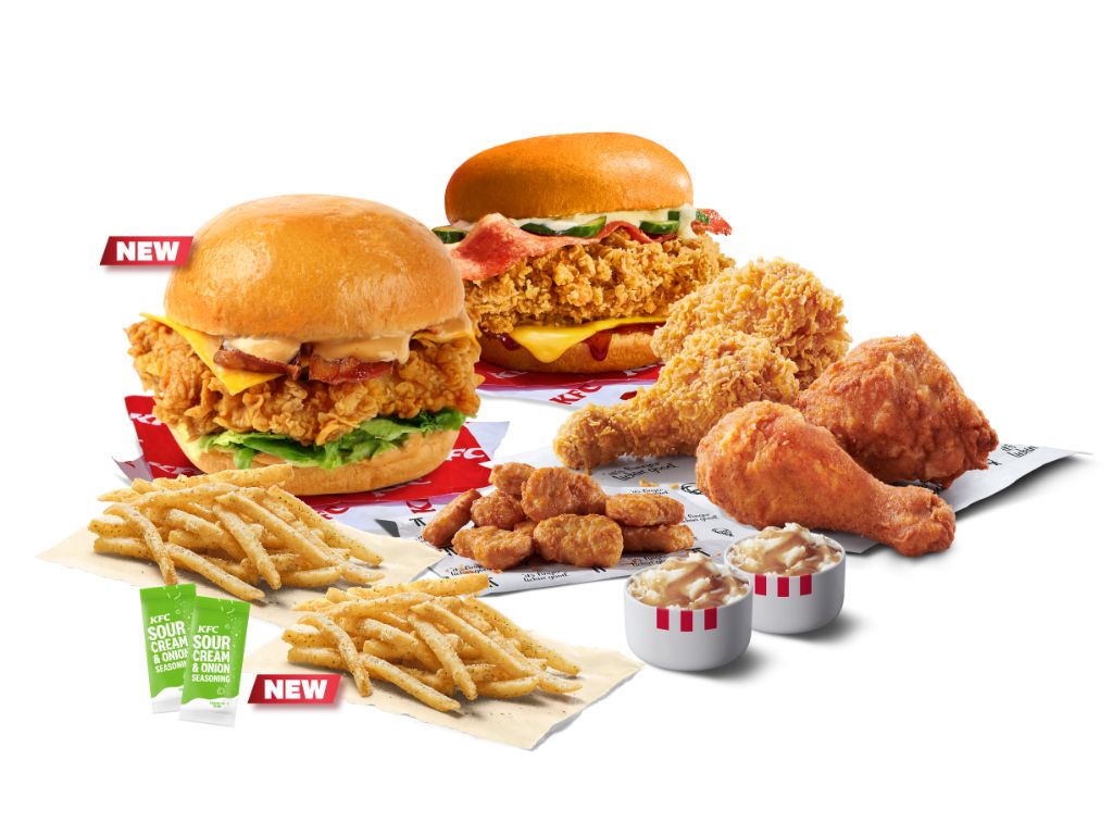 The Mega Feast features an Ultimate Smokey burger, a Smokey hot Zinger burger, four pieces of chicken, 9-piece nuggets, two sour cream & onion shaker fries, and two whipped potatoes. Photo: KFC kfc ultimate smokey burger