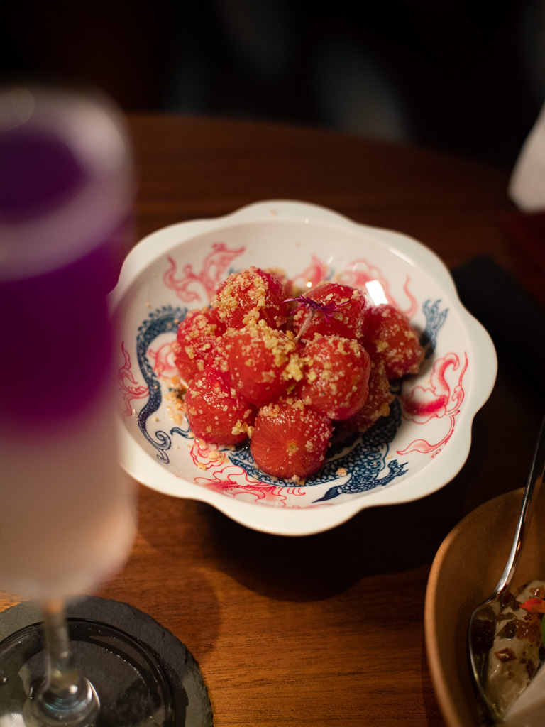 Small, but mighty — these tomatoes are so addictive. Photo: Evan Mua/HungryGoWhere yanhuo restaurant singapore