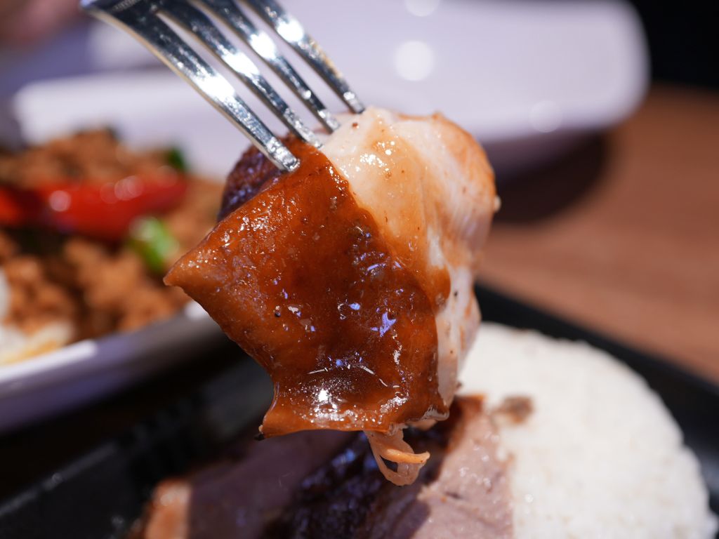 The savoury soy chicken glistens in its sauce. Photo: Angeline Ang/HungryGoWhere fairprice finest sembawang
