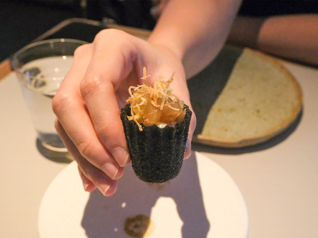Charcoal kueh pie tee with gong gong, Argentinian red prawns, and fried leek. Photo: Gary Lim/HungryGoWhere Belimbing