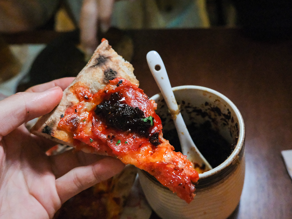 Spread a dollop of housemade chilli to amp up the flavour. Photo: Gary Lim/HungryGoWhere Puffy Bois