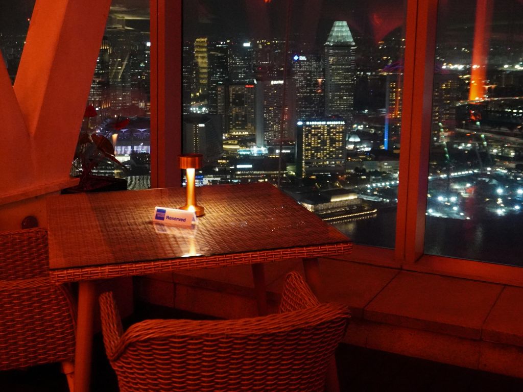 In the evening, the terrace lounge offers a beautiful cityscape view in its tall glass windows. Photo: Angeline Ang/HungryGoWhere Altro Zafferano Italian Restaurant