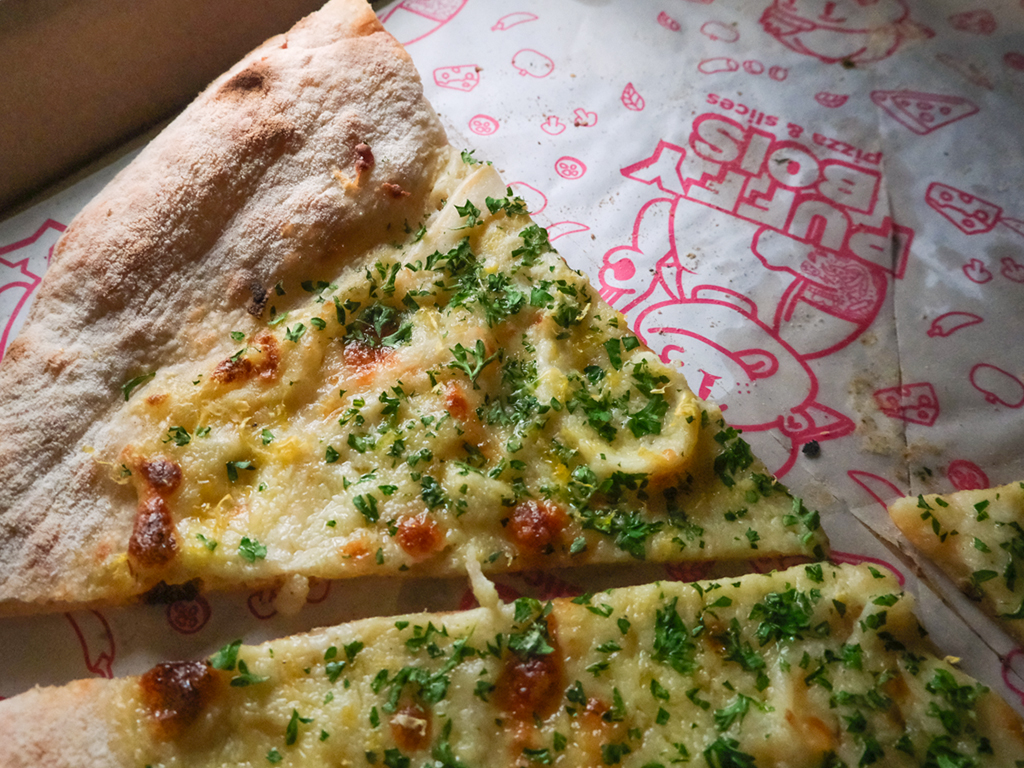 A seafood pizza with zero rubbery calamari. Photo: Gary Lim/HungryGoWhere Puffy Bois