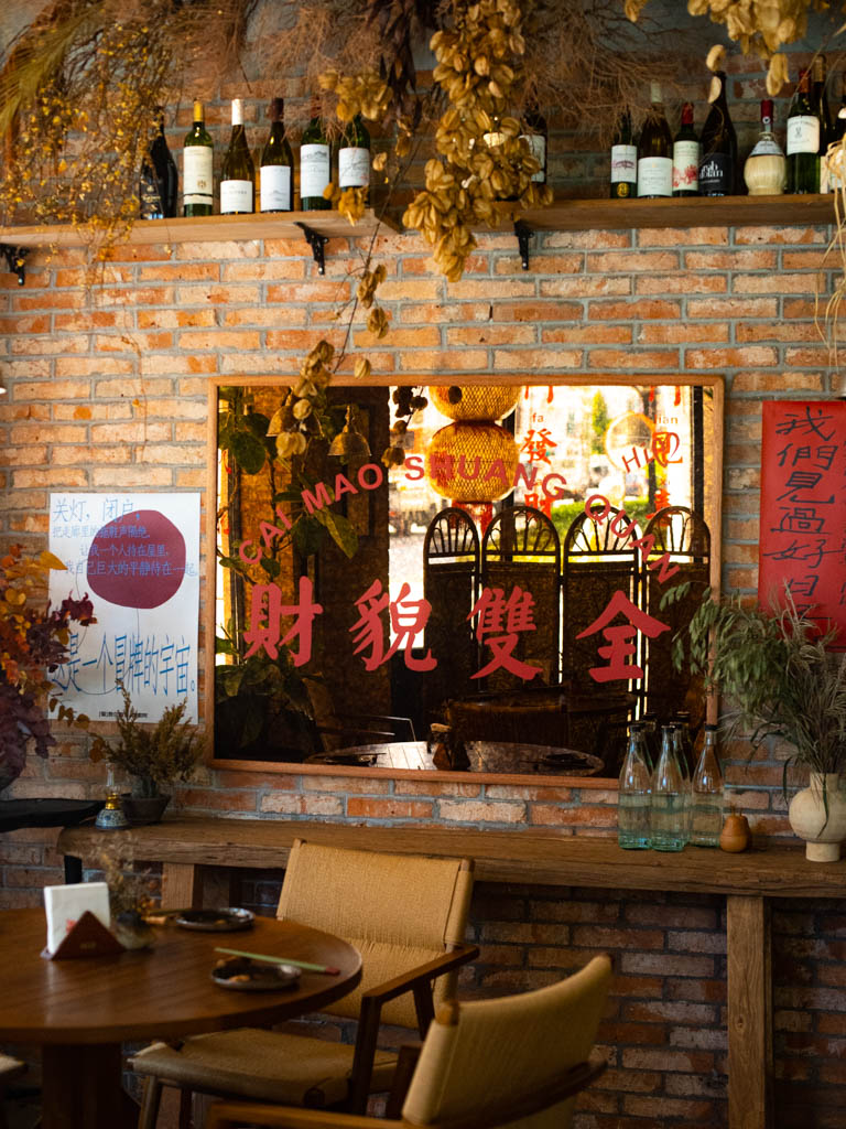 You’ll find plenty of reds and floral arrangements throughout the cafe. Photo: Evan Mua/HungryGoWhere yanhuo restaurant singapore