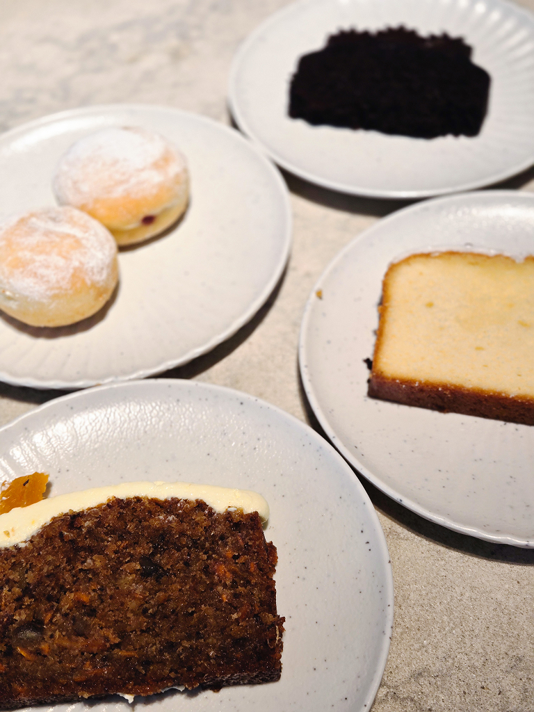 Clockwise from left: Raspberry-filled donuts, chocolate cake, lemon cake, carrot cake. Photo: Zawani Abdul Ghani/HungryGoWhere bedrock origin