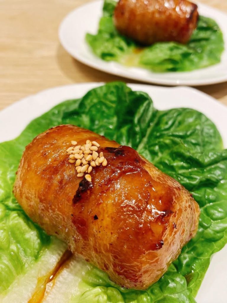 The Nikumaki onigiri is a rice ball wrapped with sliced pork, marinated with a special soy sauce. Photo: Tsukado Nojo/Instagram steamboat singapore