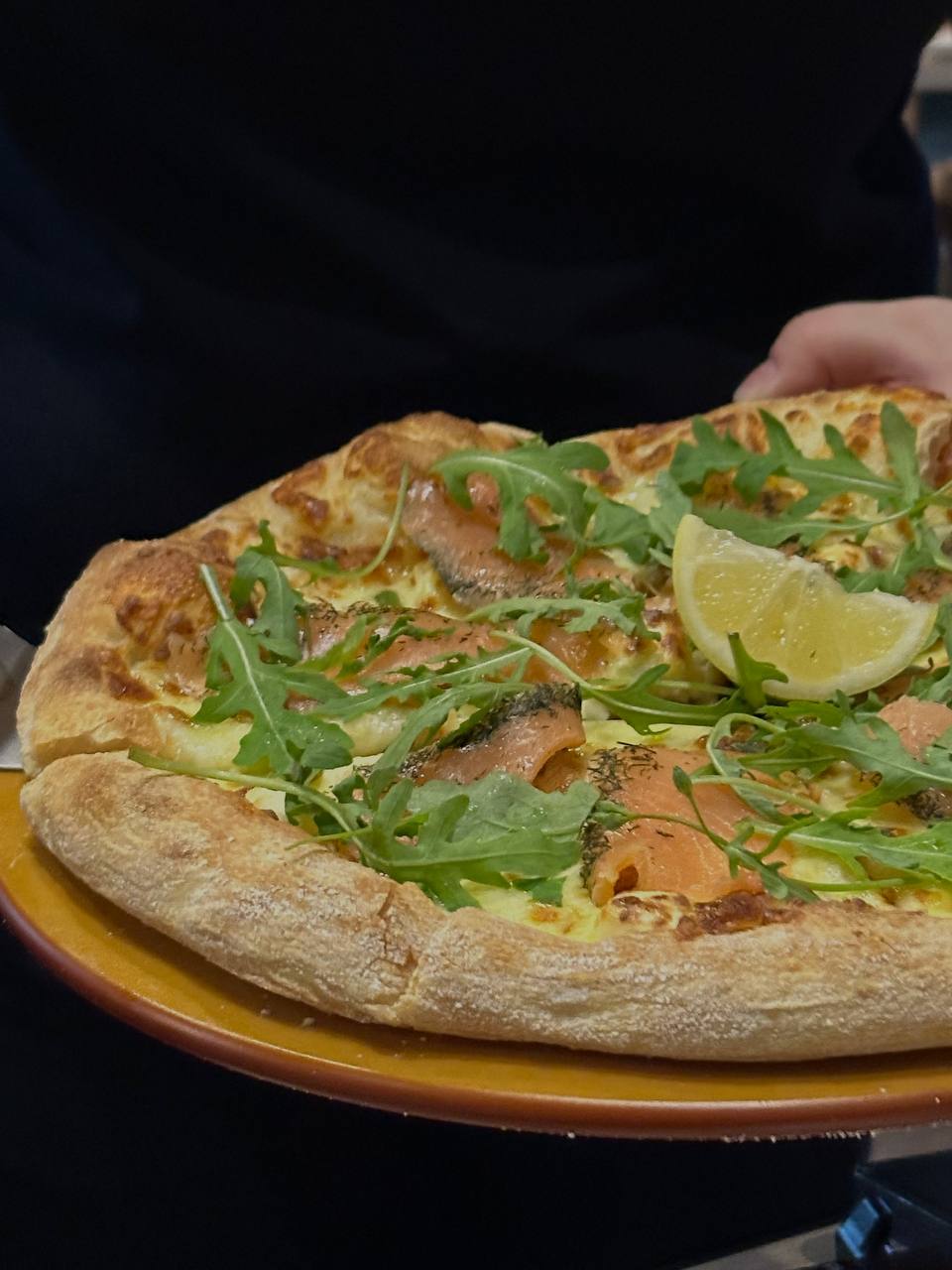Salmon & wildrocket pizza. Photo: Shannon Ong/HungryGoWhere sourdough pizza hut