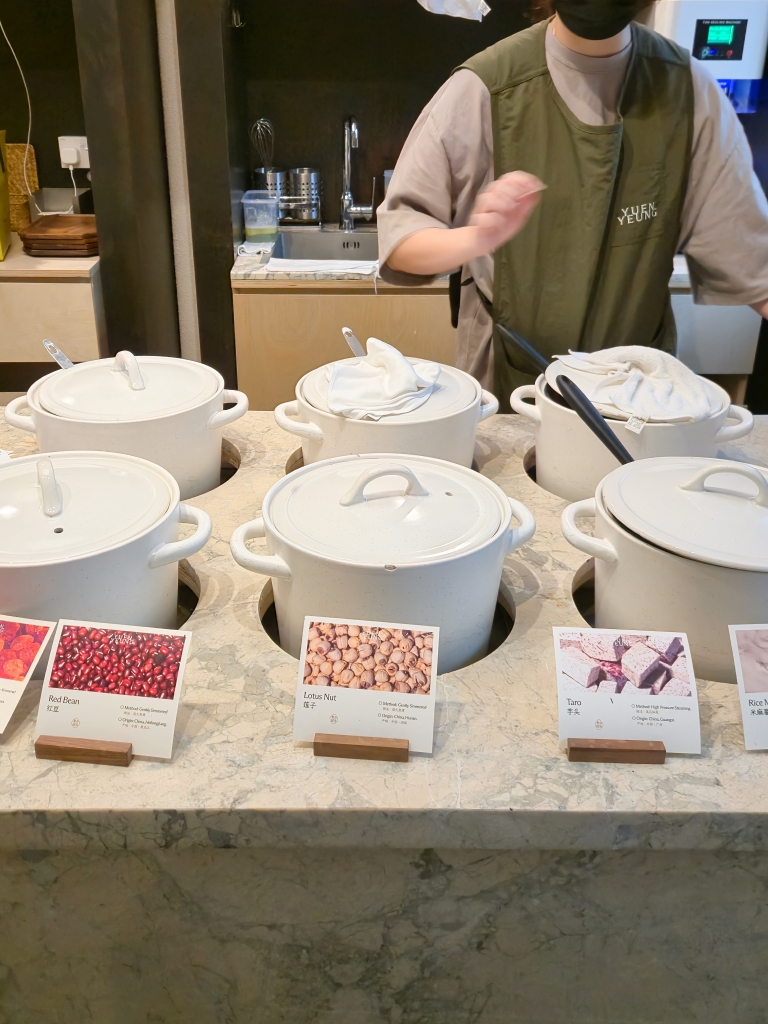 Pots of dessert toppings are placed outside the kitchen. Photo: Zawani Abdul Ghani/HungryGoWhere yuen yeung desserts neil road