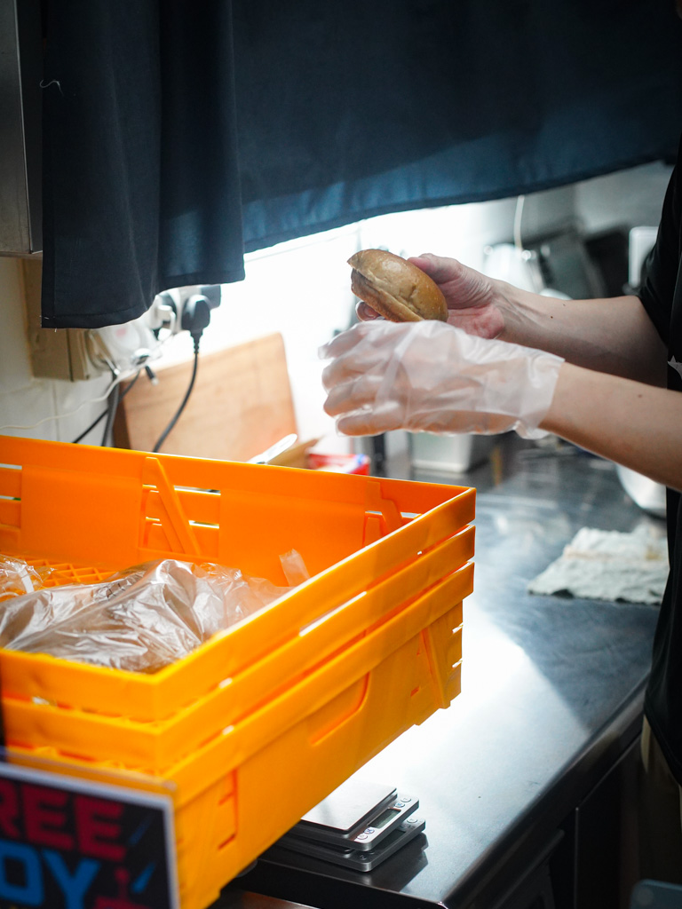 The R&D process included getting this darker coloured bun from a local bakery that works perfectly. Photo: Evan Mua/HungryGoWhere kine burgers