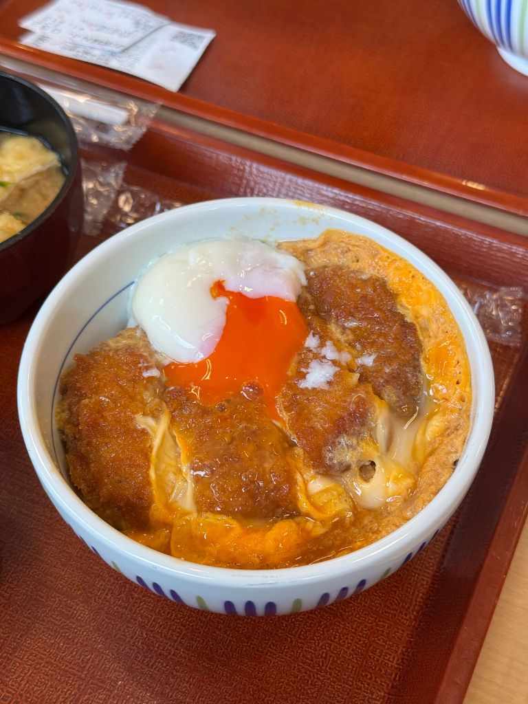 The katsu don features an additional onsen egg. Photo: Gaelmaine Hoong/HungryGoWhere tokyo food
