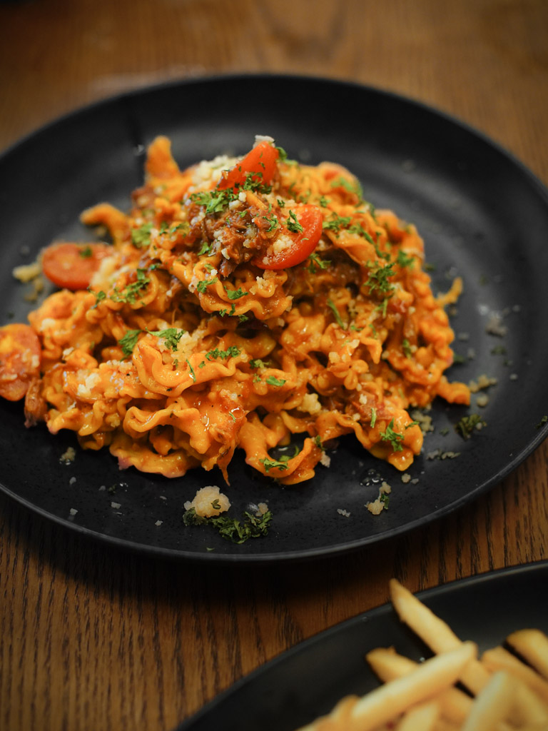 The ragu is painstakingly cooked — he doesn’t use a pressure cooker. Photo: Evan Mua/HungryGoWhere eightisfy western
