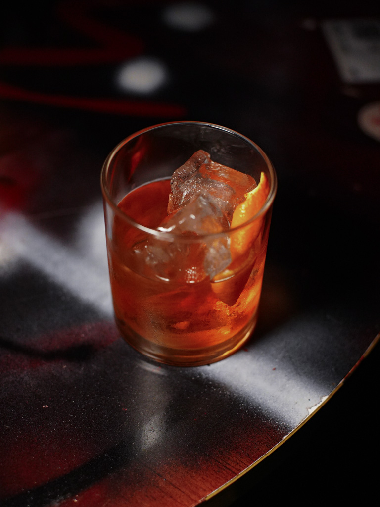 We all need a punchy negroni for those hard days. Photo: Evan Mua/HungryGoWhere the cocktail office singapore