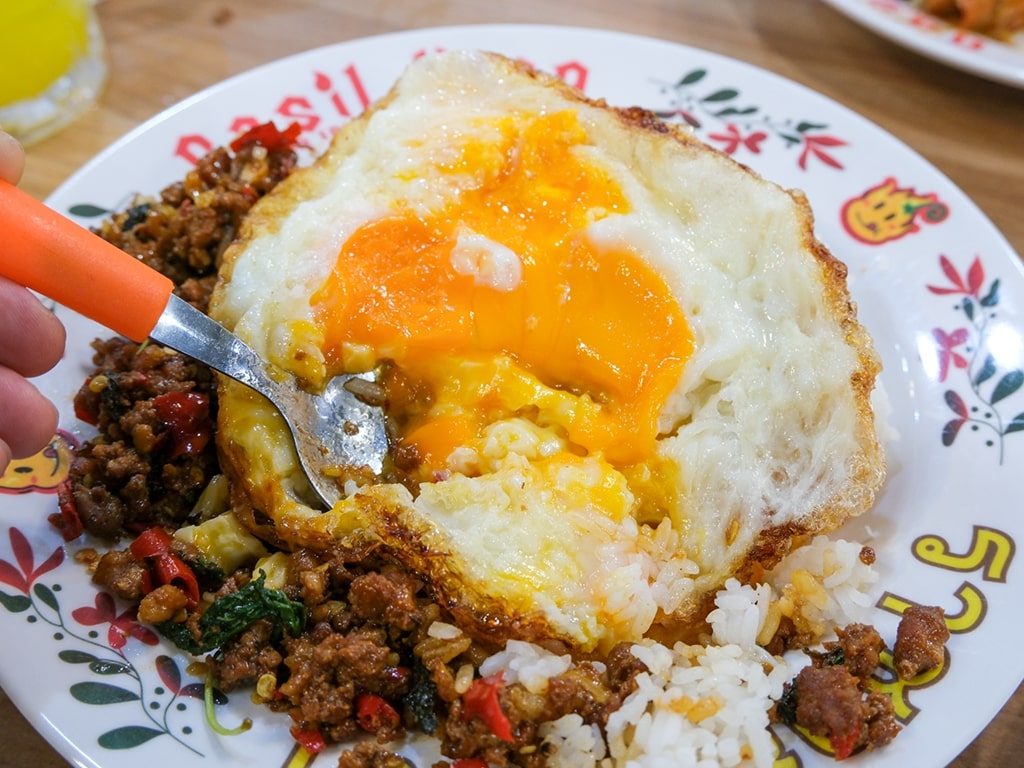 Two eggs in your rice is the sweet spot. Photo: Gary Lim/HungryGoWhere Basil King Singapore