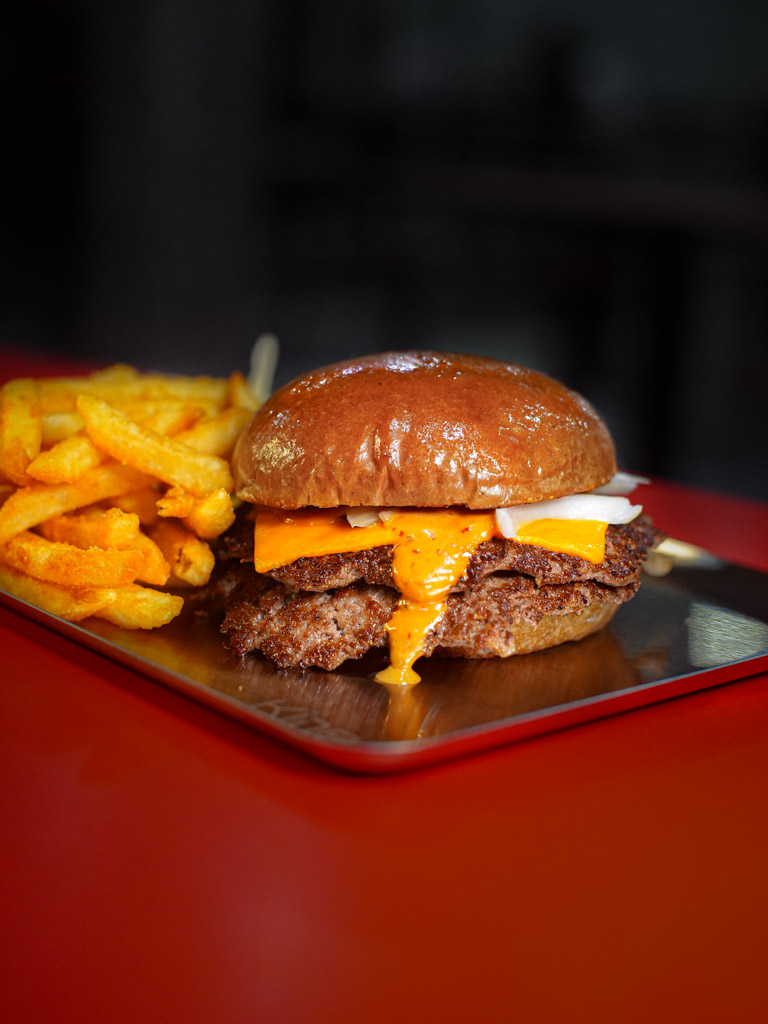 Smash burgers are rarer in Singapore. Photo: Evan Mua/HungryGoWhere kine burgers
