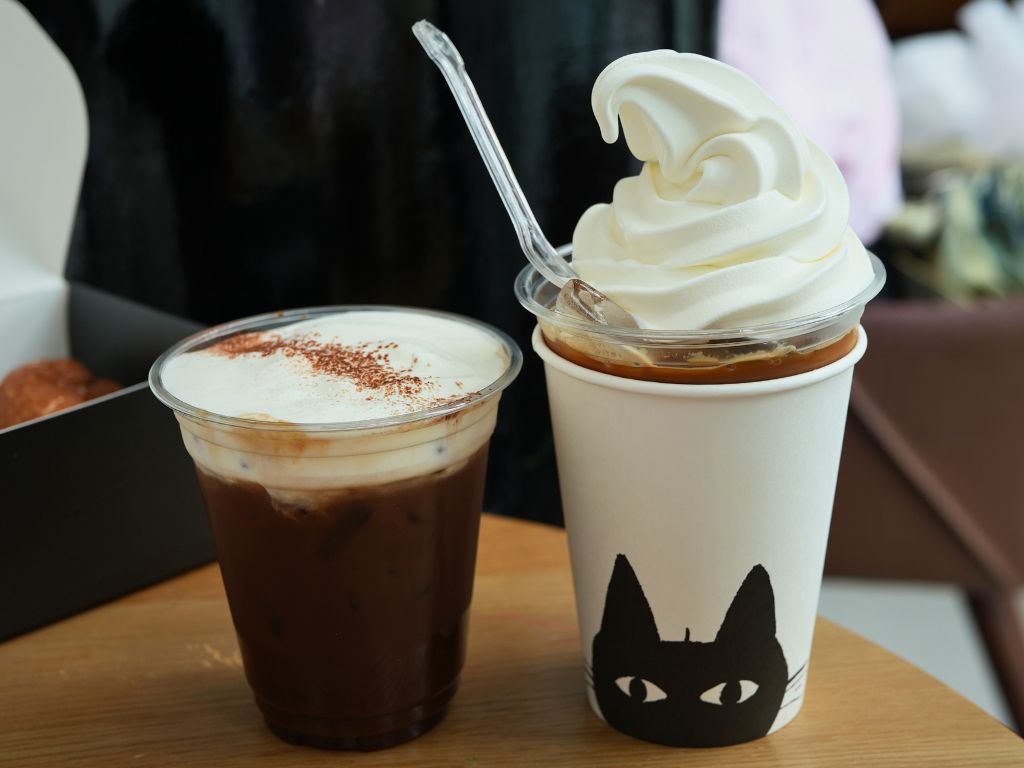 From left: Iced almond mocha java cream coffee (iced) and ice cream latte. Photo: Angeline Ang/HungryGoWhere standard bun