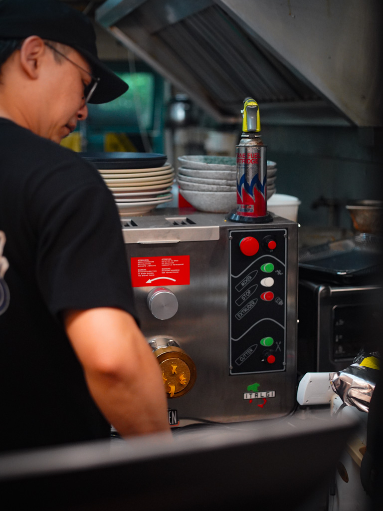 Here, CK is using his recent purchase to make mafaldine. Photo: Evan Mua/HungryGoWhere eightisfy western