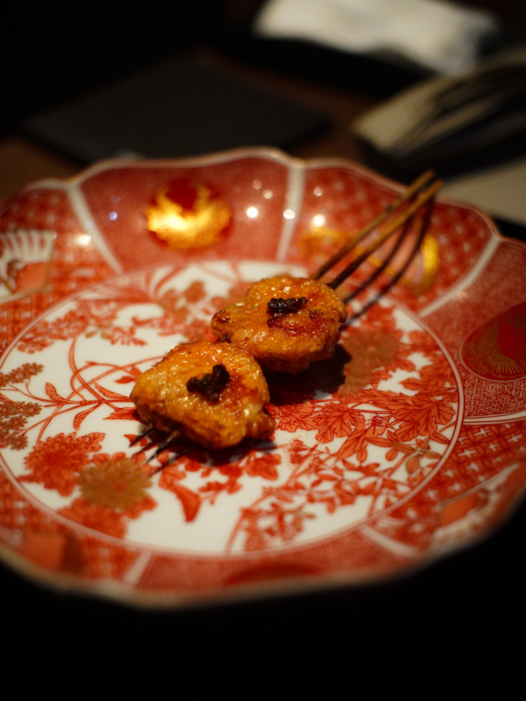 Chicken wings brushed with chicken fat makes the most amazing crunchy skin. Photo: Evan Mua/HungryGoWhere firebird by suetomi