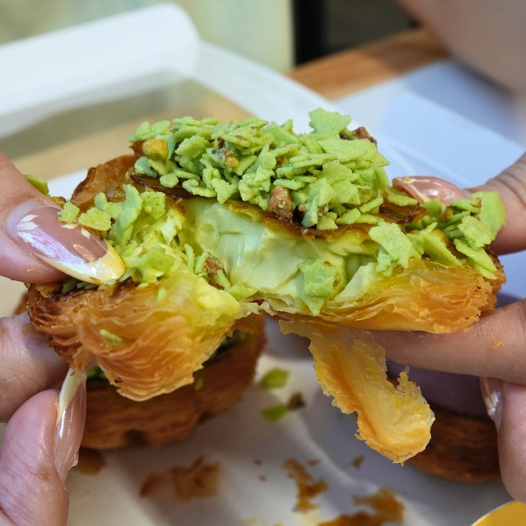 Pistachio croissant egg tart. Photo: Angeline Ang/HungryGoWhere bao's pastry