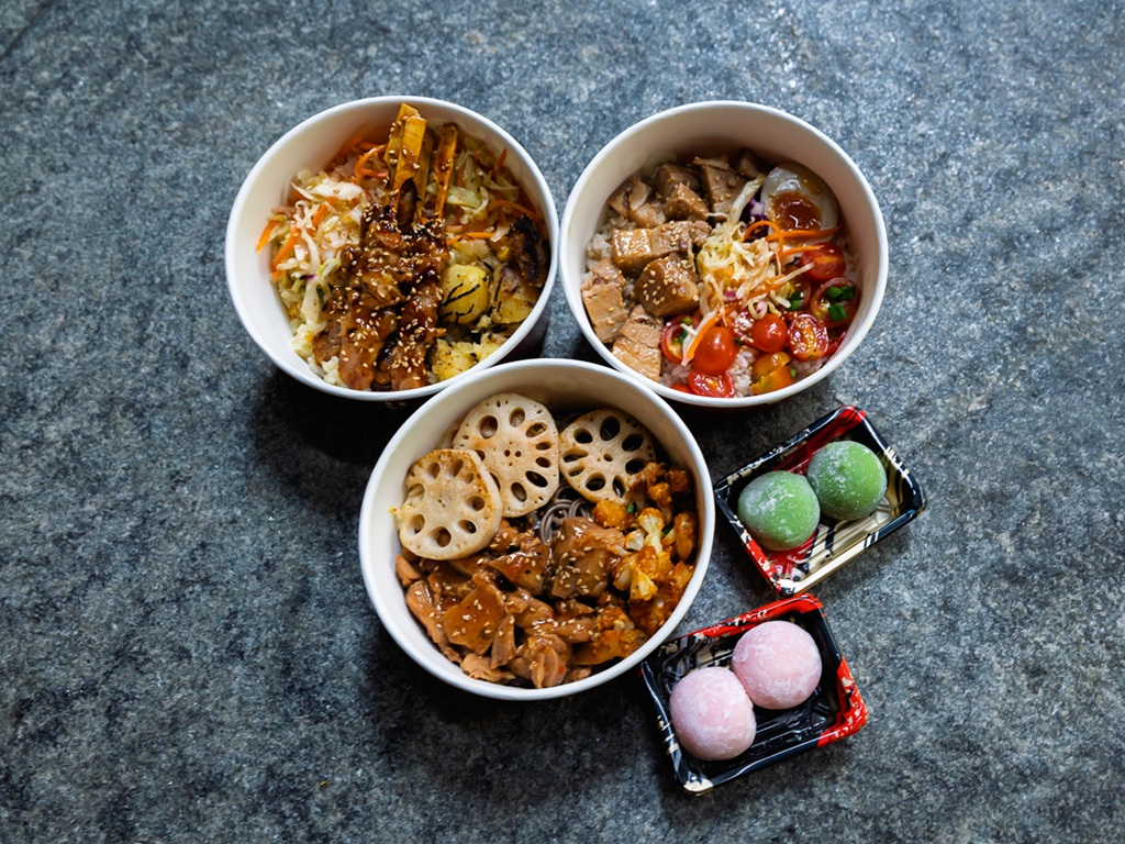 Clockwise from top left: Regular bowl with yakitori skewers, pork belly, momo peach and matcha azuki mochi and Japanese tomato chicken. Photo: Abdul Rahim Anwar/HungryGoWhere peko peko