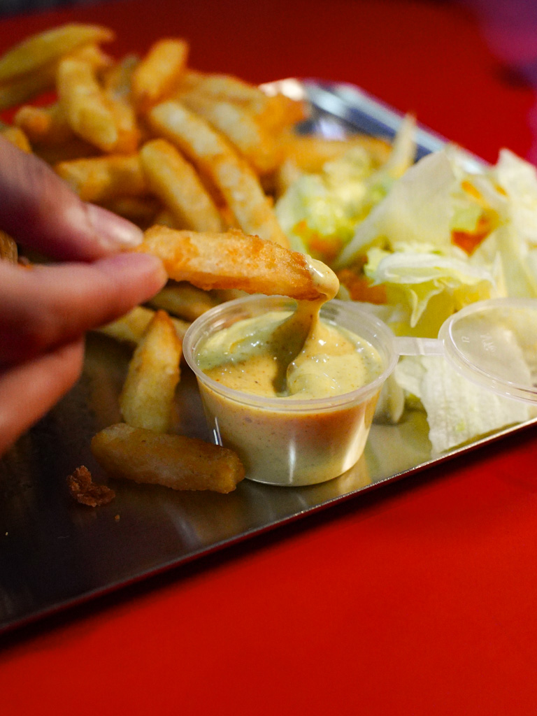 Fries and curry sauce are always a killer combo. Photo: Evan Mua/HungryGoWhere kine burgers