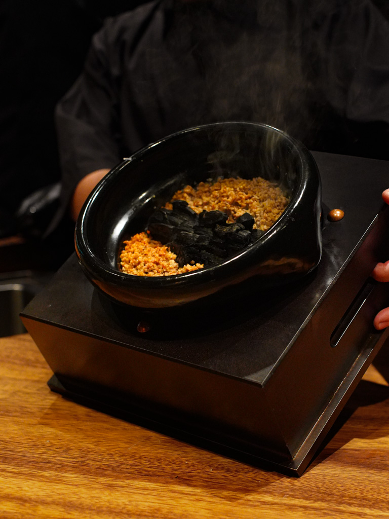 The claypot is infused with oak wood smoke. Photo: Evan Mua/HungryGoWhere firebird by suetomi