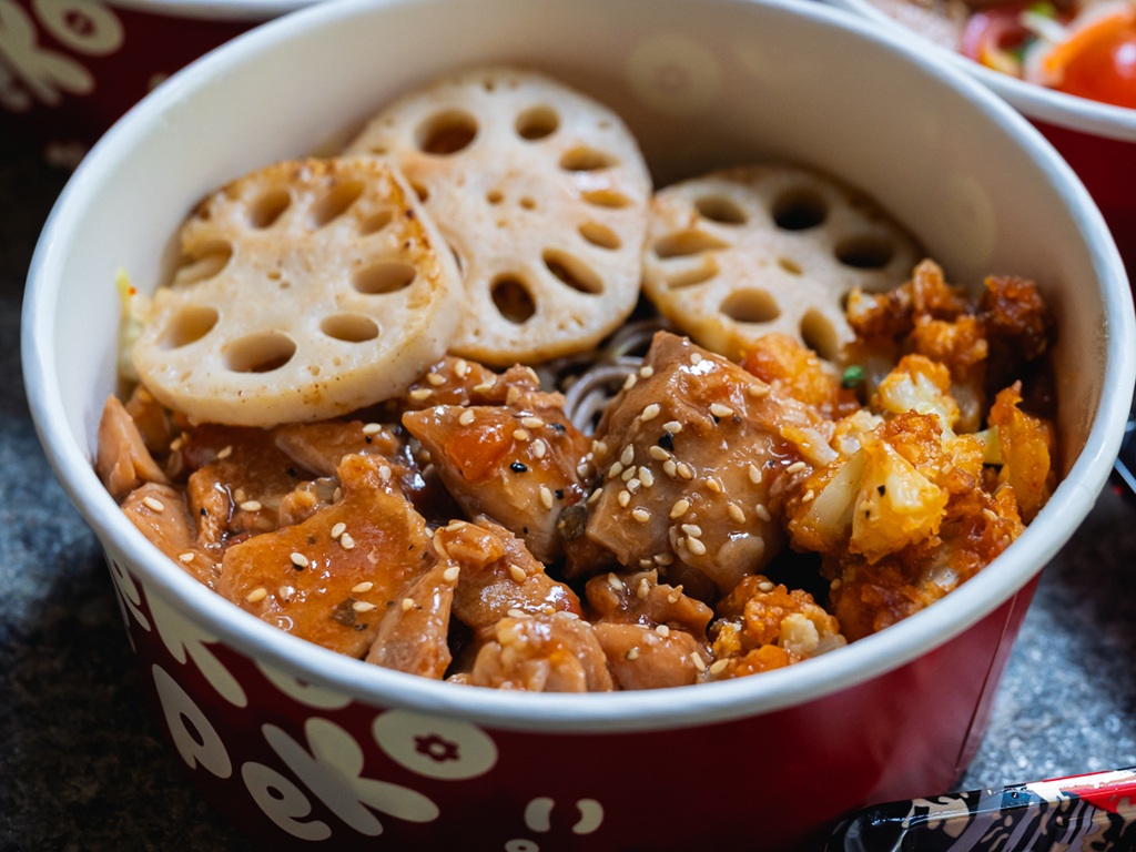 Japanese tomato chicken with sesame soba, dashi renkon lotus root and sweet & spicy cauliflower.Photo: Abdul Rahim Anwar/HungryGoWhere peko peko