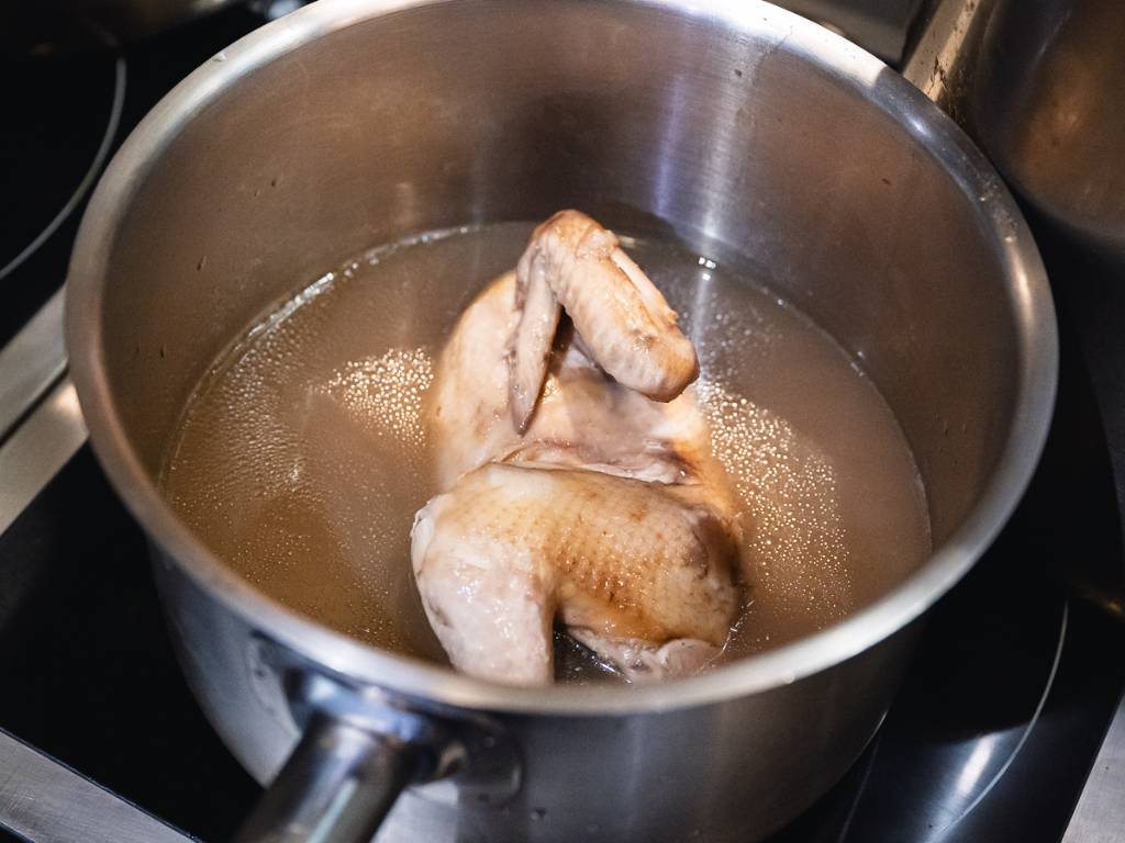 The half-chicken broth, being prepared to be served individually. Photo: Abdul Rahim Anwar/HungryGoWhere kalguksu seoul noodle shop