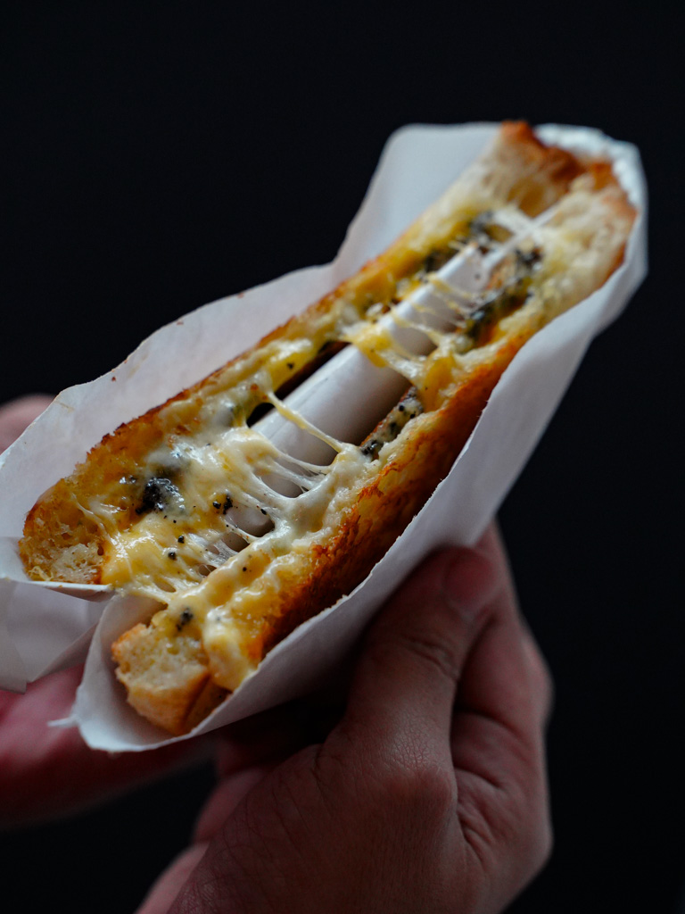 Truffle aroma and sexy cheese pulls. Photo: Evan Mua/HungryGoWhere open secret