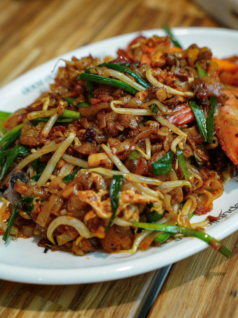 Can’t go wrong with a hearty plate of Penang char kway teow. Photo: Evan Mua/HungryGoWhere the food place by food republic