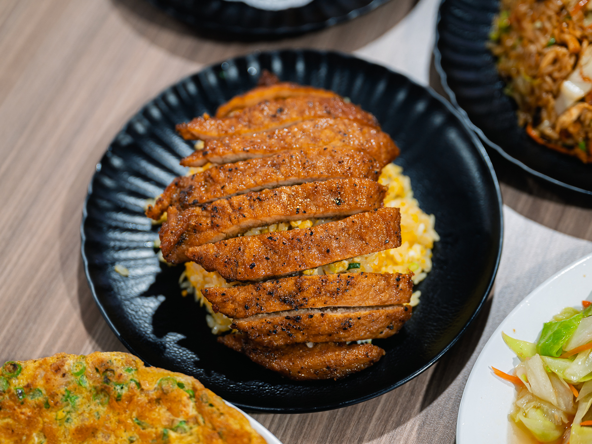 The glistening pork chop screams “yummy”. Photo: Abdul Rahim Anwar/HungryGoWhere Yi Family Dynasty Fried Rice