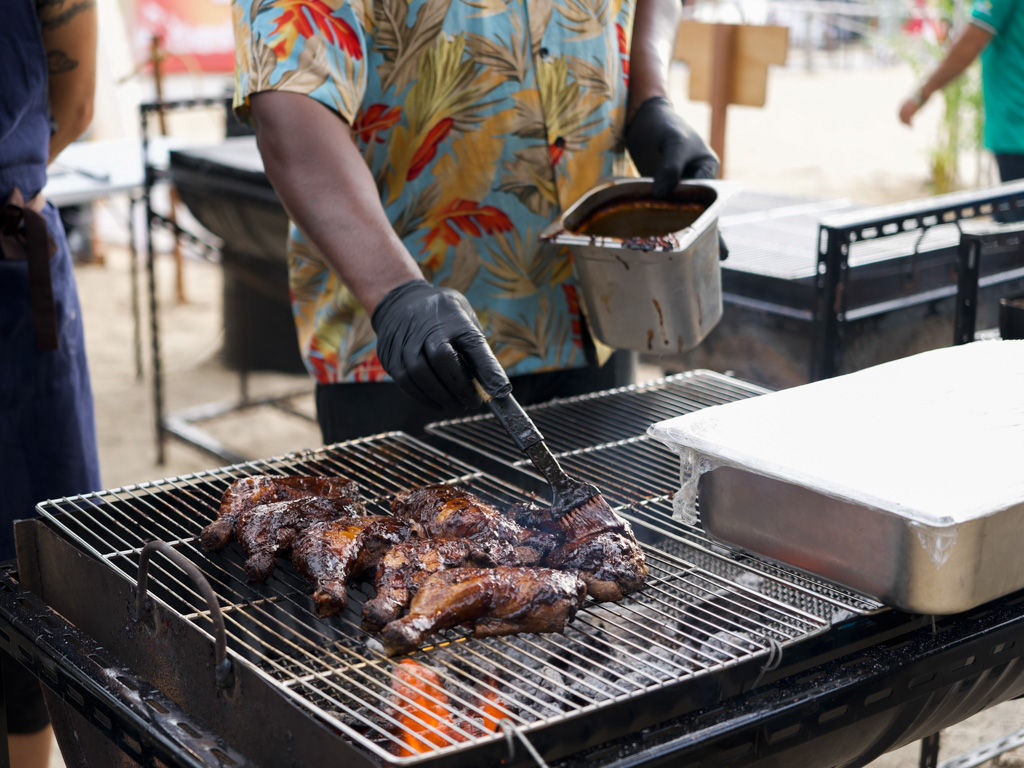 Chef Ricardo Allen at the grill, working magic on his jerk chicken. Photo: Angeline Ang/HungryGoWhere sentosa grillfest 2025