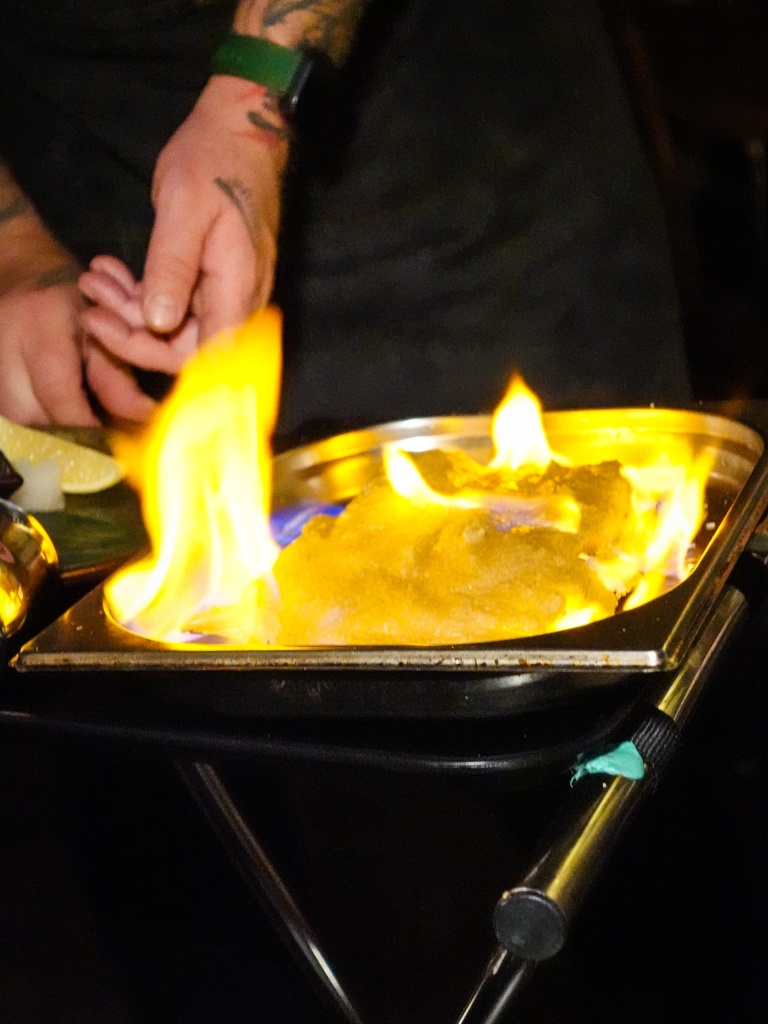 Salt-baked hamachi collar. Photo: Sarah Chua/HungryGoWhere neon pigeon 10th anniversary menu