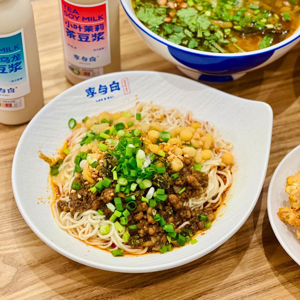 The Chengdu noodles with meat sauce and green peas. Photo: Shannon Yap/HungryGoWhere lee & bai singapore