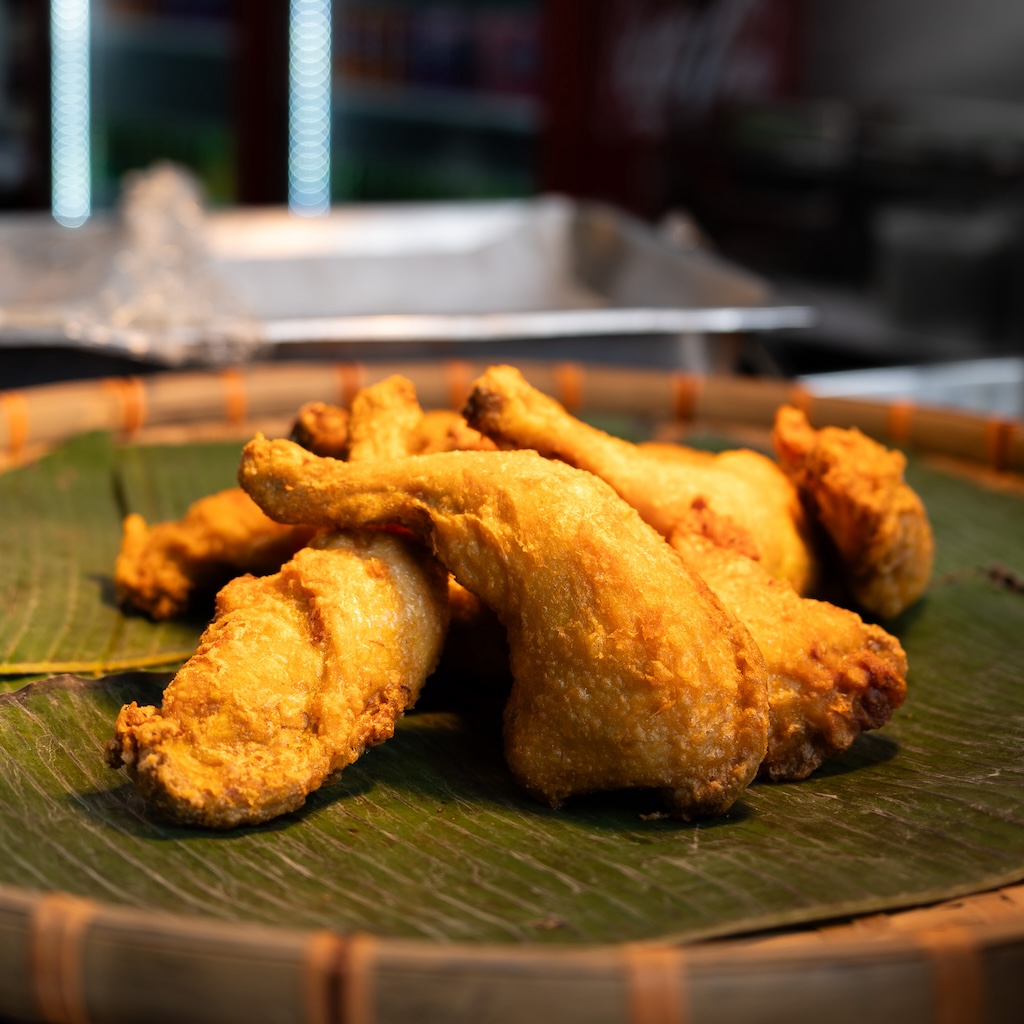 A vibrant display of nasi lemak chicken draws curious crowds. Photo: Angeline Ang/HungryGoWhere sentosa grillfest 2025