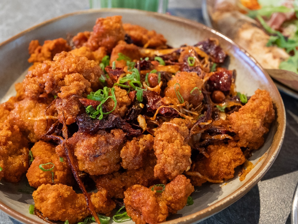 The dangerously addictive spicy popcorn chicken. Photo: Angeline Ang/HungryGoWhere trifecta riders lounge
