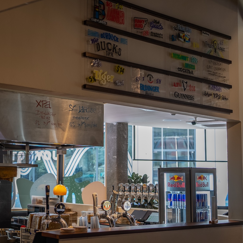 Check out the beer wall to see what’s on tap — the selection rotates. Photo: Angeline Ang/HungryGoWhere trifecta riders lounge