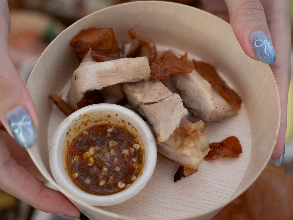 Crispy roasted pork with a delicious spicy sauce. Photo: Angeline Ang/HungryGoWhere sentosa grillfest 2025