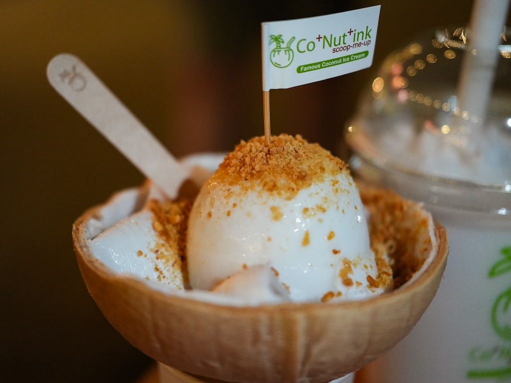 A sweet coconut ice cream finale — smooth, cold, and served in a husk.Photo: Angeline Ang/HungryGoWhere sentosa grillfest 2025
