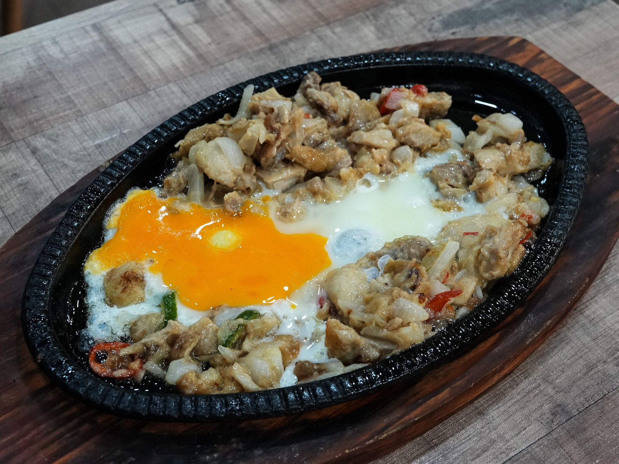 The chicken sisig is creamy with a hint of char. Photo: Angeline Ang/HungryGoWhere nanay's kitchen