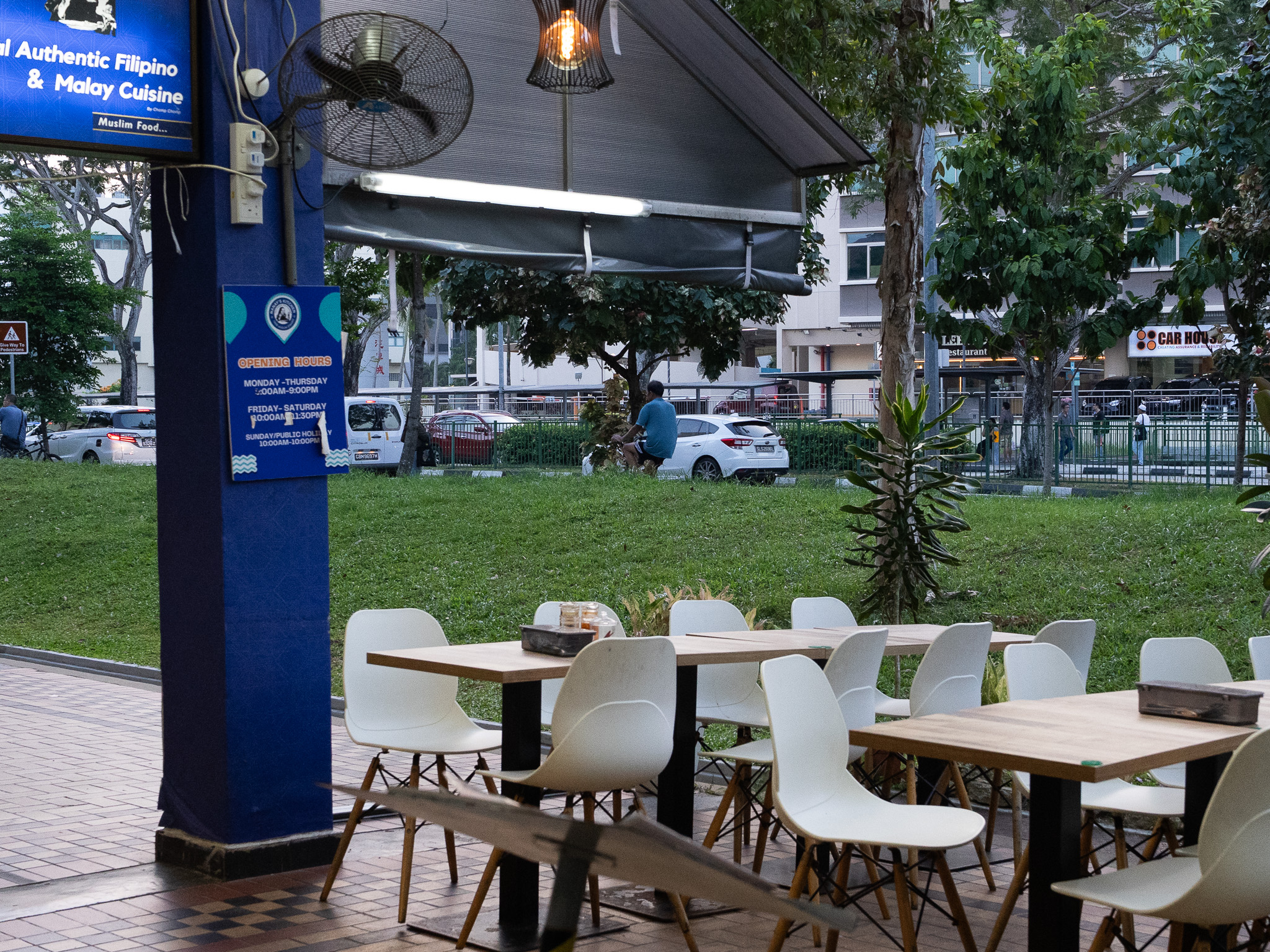 The outdoor dining area is a cosy, breezy spot. Photo: Angeline Ang/HungryGoWhere nanay's kitchen